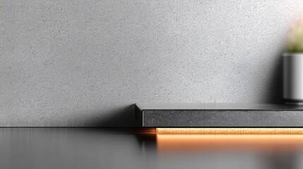 Large empty space with dark gray wall and light gray floor. Spot lights shine through smoke for a dramatic display area