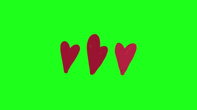 Hearts three red painted brush strokes on a green screen background with black borders for easy compositing