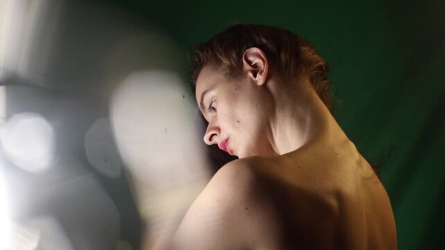Woman Showcasing Back with Dreamy Bokeh