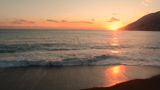 Golden sunset over the beach of Maiori, Amalfi Coast, Italy