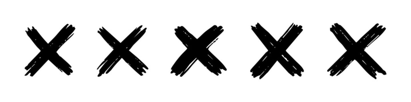 Set of five hand-drawn black grunge X marks or cross symbols isolated on a white background. Hand painted ink brush stroke design elements.