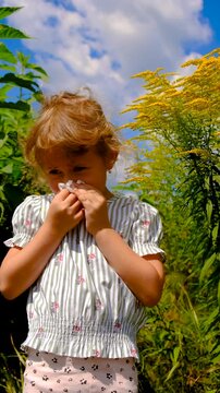The child is allergic to ragweed. Selective focus.