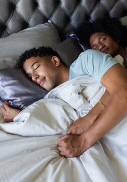 Teenage student counting aperiodic cycles starting at top-left vertex on 2&times;3 directed grid at desk