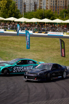 Kyiv, Ukraine, Chaika Raceway - August 3, 2023: Drift car in a race with smoke. Drift car close-up. Drift cars and drivers, street racing, auto culture. Drift culture.