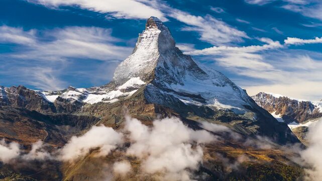 Zermatt, Switzerland with the Matterhorn mountain peak with cloud cover.