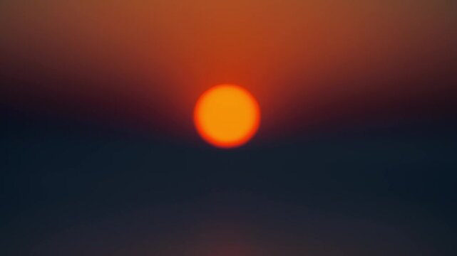 Blurred glowing sunset over baltic sea with rich orange and dark blue tones triptych