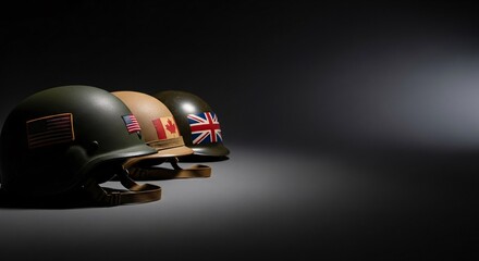 Fototapeta premium Military helmets with flags of united states canada and united kingdom lined up in dark studio setting representing alliance nato forces international defense cooperation