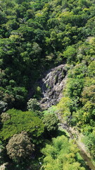 Aerial View of King&rsquo;s Bay Waterfall Cascading from Tropical Cliffs into the Caribbean Sea in Tobago