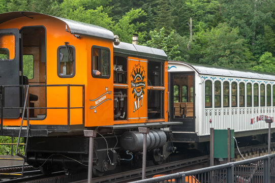 A Mount Washington Cog Railway train car begins its climb of the highest peak in the northeast