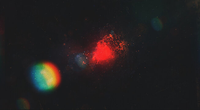 Colorful Prism red Flare with Rainbow Light Streak on Black Backgrounddistressed flare light leak on black background,abstract analog film burn lens light leak,abstract colorful lens leaked camera 