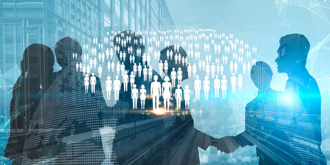 Fototapeta na wymiar Business professionals shaking hands in a modern corporate environment with digital connections and a crowd of people in the background Quark.