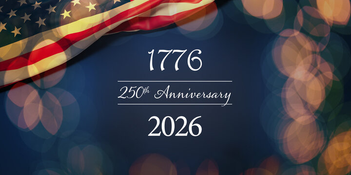 The wrinkled flag of the USA draped onto a flat dark blue surface with a bokeh light overlay and the text "1776 250th Anniversary 2026"