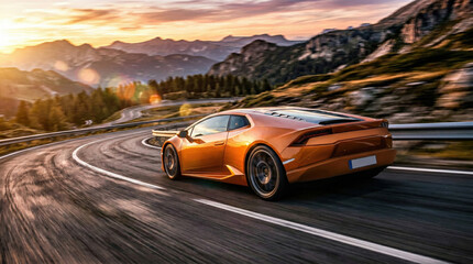 Fototapeta premium Orange sports car driving fast on mountain road