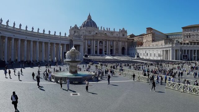 Crowd of people gathering in Piazza San Pietro of Vatican City to listen to pope speech during the eastern religious holidays, aerial slow motion shot
