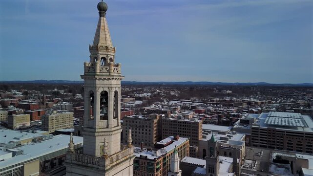 Springfield Massachusetts tower and downtown winter aerial orbit