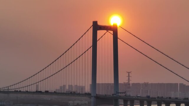 Aerial footage of landscape in Guangzhou city, China (Words on the bridge mean Nansha bridge in Chinese)