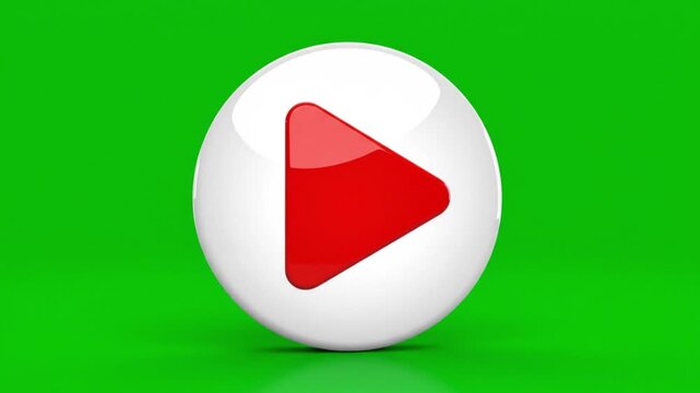 A white spherical button with a red play icon centered on a green background viewed from directly above