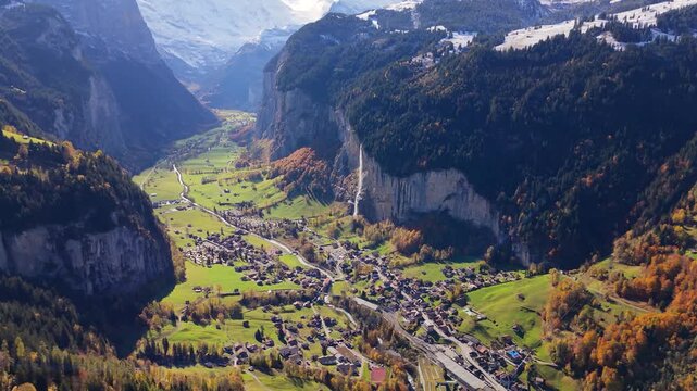 Lauterbrunnen valley aerial panoramic view showing U shaped glacier valley cliff walls and village. Lauterbrunnen, Canton of Bern, Switzerland.
