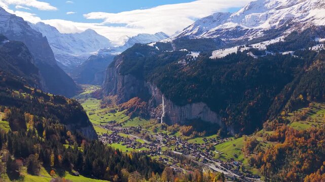 Lauterbrunnen valley aerial panoramic view showing U shaped glacier valley cliff walls and village. Lauterbrunnen, Canton of Bern, Switzerland.