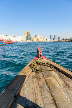 POV view from a traditional abra boat crossing the Dubai Creek at day