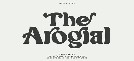 Obraz premium The Arogial Elegant playful groovy font. Vector bold font for headings, flyer, greeting cards, product packaging, book cover, printed quotes, logotype, apparel design, album covers, Illustration