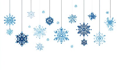 Blue snowflakes of various designs hanging from thin threads against a white backdrop