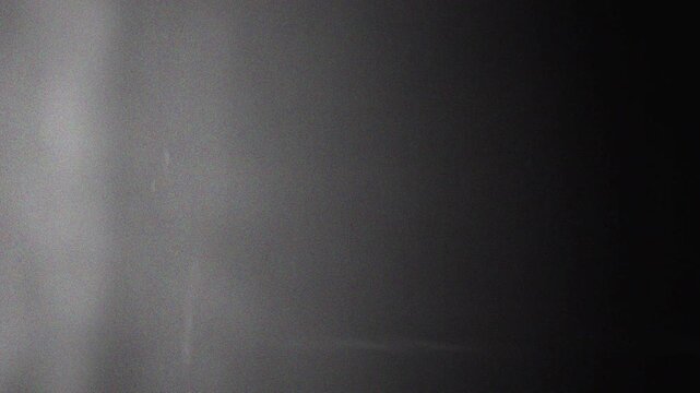 Cold Light Noise Overlay with Subtle Blue Grain Texture Background