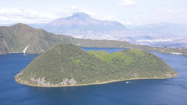 Cotacachi, Ecuador - November 5, 2025: Cuicocha Lagoon is a crater lake at the foot of the Cotacachi Volcano. Its deep blue waters and volcanic islets create a stunning natural landscape.