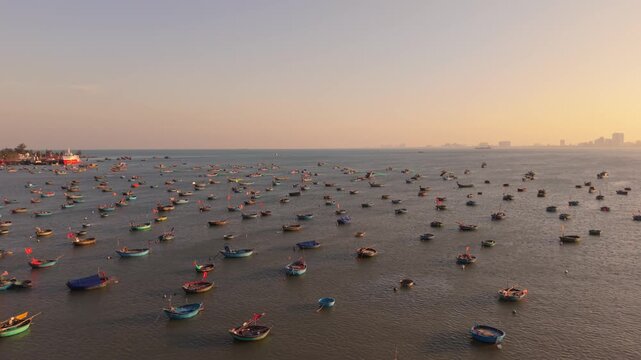 Aerial View Fishing Boats Da Nang Dawn Calm Sea Dotted With Round Basket Boats, Warm Pastel Sky, Distant Skyline, Fishermen Prepping Nets, Traditional Craft, Tranquil Coastal Atmosphere