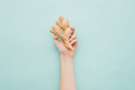 hand holding ginger
