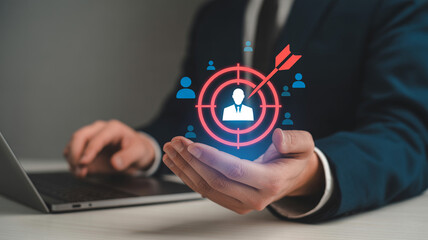 Businessman targeting ideal customer with marketing strategy and focus