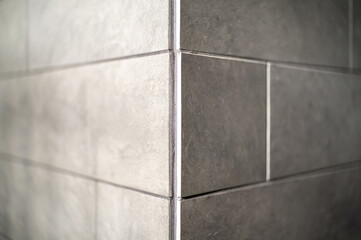 Ivory White Ceramic Wall Tiles at a Corner.