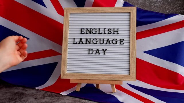 Message ENGLISH LANGUAGE DAY on background of Great Britain UK flag. British national flag with concept of High school university college education, language courses, online distance learning