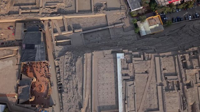 Aerial view of Huaca Pucllana pyramid in Lima, Peru, in warm sunlight
