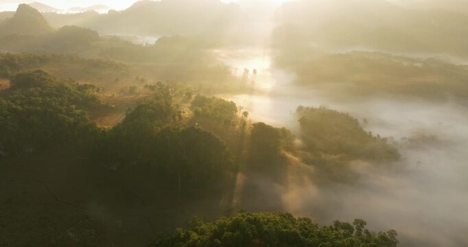 Breathtaking Sunrise Over A Sea Of Clouds Near Ban Jabo Remote Black Lahu Village In Pang Mapha, Mae Hong Son, Thailand. Aerial Shot