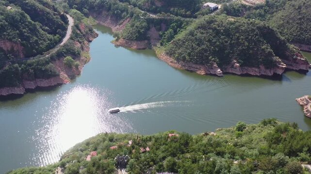Breathtaking aerial footage of Guangfu Ancient City in Hebei, featuring well-preserved Ming Dynasty walls surrounded by moats, traditional architecture, and beautiful northern water town scenery.