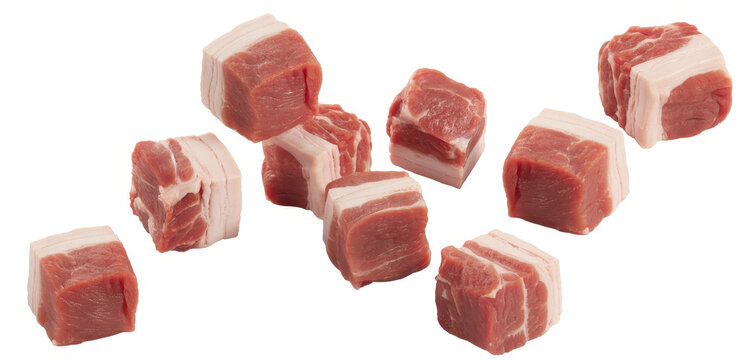Raw pork chunks with fat on white background meat fatty