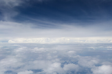 Fototapeta premium Dramatic cloudscape with fluffy white clouds and blue sky
