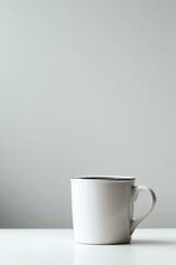 Empty White Mug On White Surface