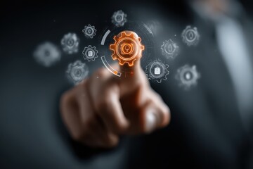 Obraz premium Person touching glowing orange gear icon in digital interface