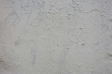 Fototapeta premium Abstract background of old damaged grey wall.