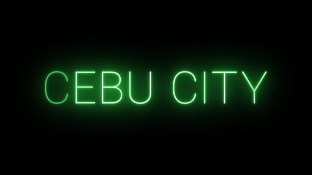 Flickering neon green glowing cebu city sign animated on black background.