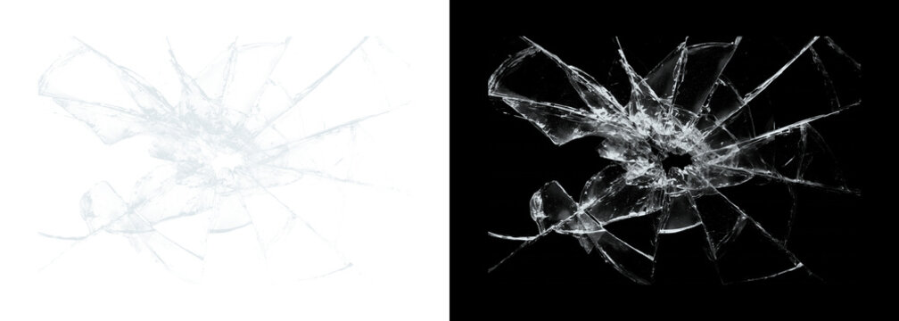 Cracked glass shattered window pane on white and black backgrounds