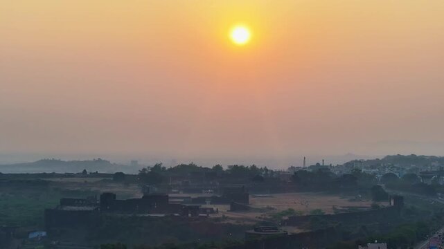 Sun with sky, bidar fort, fog and greenery at bidar, karnataka, india. day time, push back shot, drone shot, 4k.