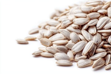 Obraz premium Minimal still life: hulled sunflower seeds arranged on pure white backdrop