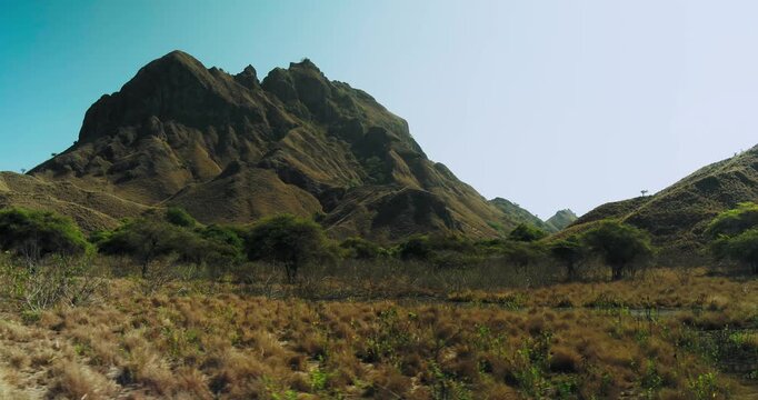 Drone Flyover of Padar Island Ridge and Tropical Coastline