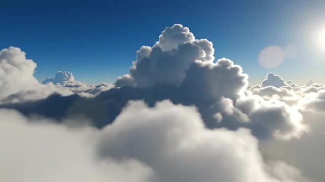 Flying high above f white clouds with a bright sun shining in the blue sky