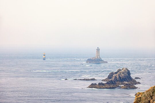 Seascape view at Pointe du raz in Bretagne with the lighthouse La vieille