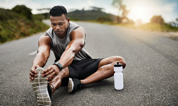 Runner, black man and stretching legs on road for fitness, workout preparation and warm up routine. Sunshine, outdoor or athlete getting ready for cardio training, health and muscle mobility exercise