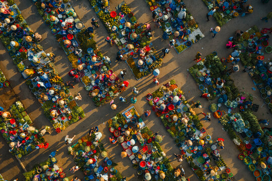 Aerial view of busy local daily life of the morning local market in Vi Thanh or Chom Hom market, Mekong Delta, Vietnam.